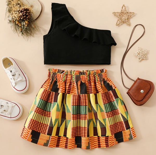 Black one shoulder crop top and tribal skirt